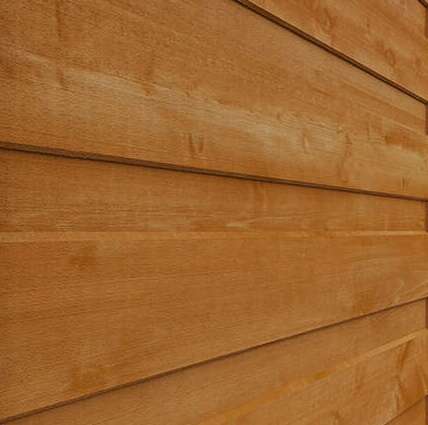 A close up of Tiger tongue and groove shed wood profile