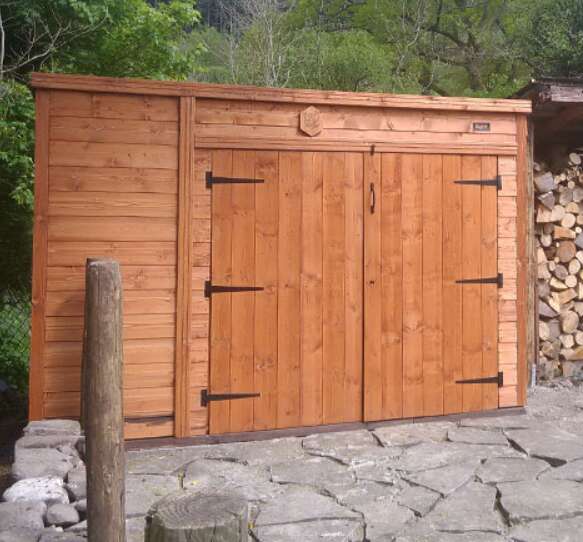 A picture containing the TigerFlex Shiplap Pent Bike Store with double doors, garden, outdoor, patio, log store