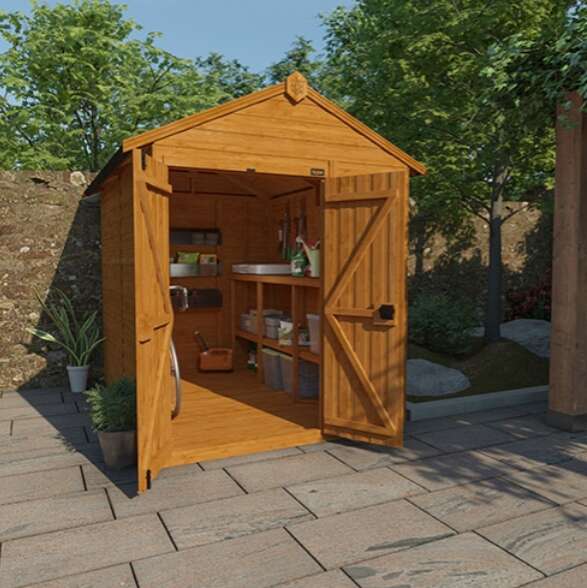 A picture containing the Tiger Shiplap Apex Windowless Shed, patio, block paving, plants, flower borders