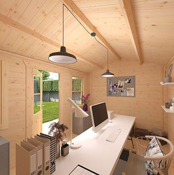 A picture of the Tiger Rosen Log Cabin interior designed as a teenage study space with wood interior, desk, chair, storage and garden view