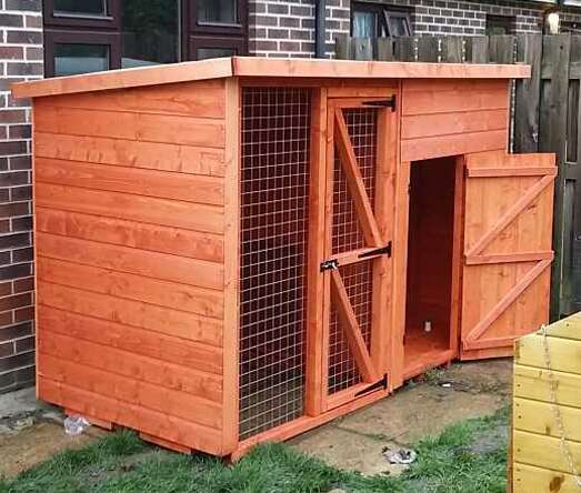 A picture containing a Tiger Sheds Pethouse, dog run, outdoor, garden, timber shed