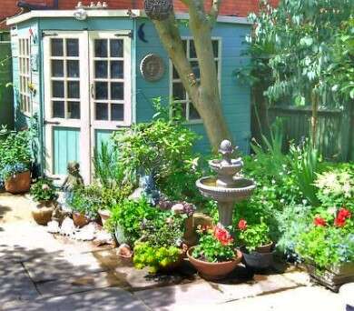 A picture containing outdoor, flowerpot, houseplant, garden, wooden summerhouse