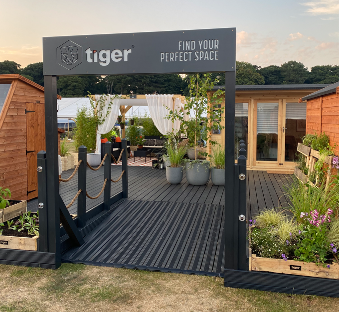 Tiger Sheds RHS show stand, sheds, grass, planters