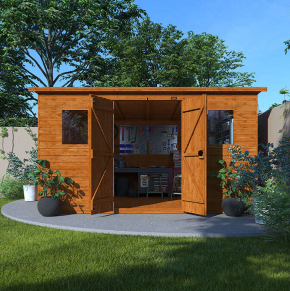 A Tiger Sheds Workman Pent Shed with open double doors windows, grass, patio