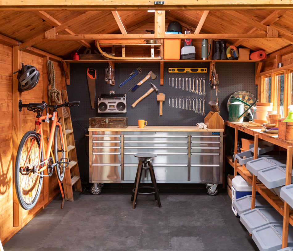 A shed with shelves and tool storage