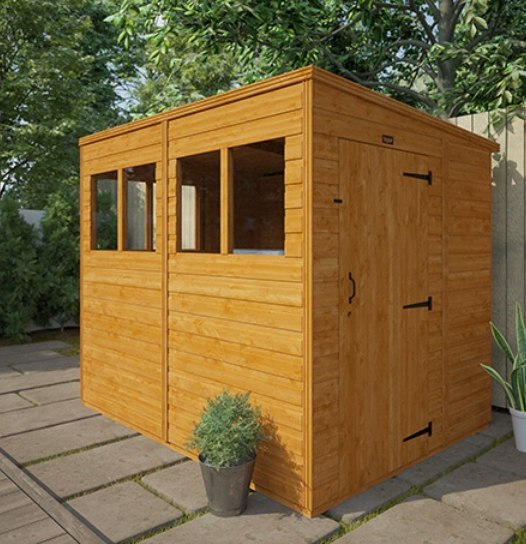 A wooden shed on a patio