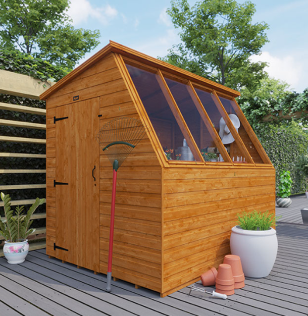 A potting shed, shiplap cladding on garden deck