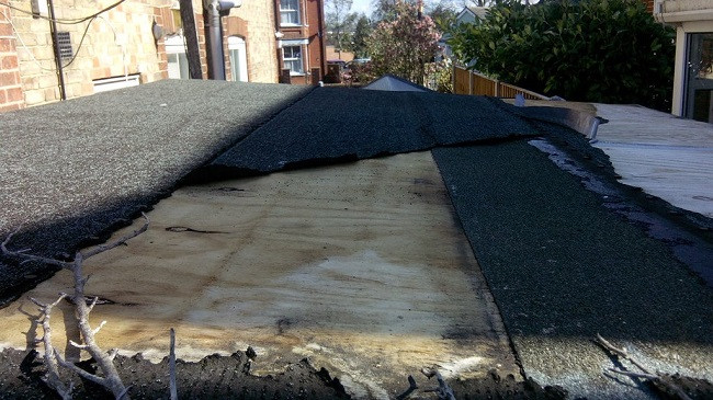 Damaged roof felt