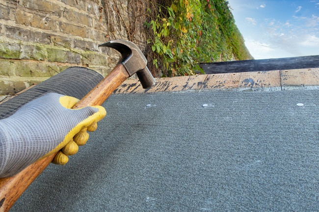 Laying shed roofing felt - repairs