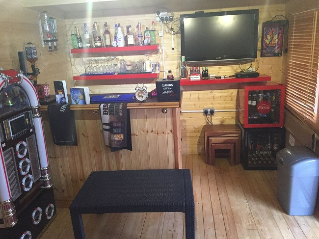 Inside of shed with TV and ar